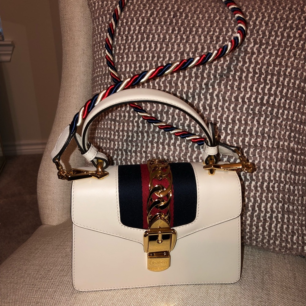 Authentic GUCCI purse used once for an event.